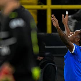 Rangers' Colombian striker Alfredo Morelos celebrates scoring the second goal during the UEFA Europa League play-off football match BVB Borussia Dortmund v Rangers in Dortmund on February 17, 2022. (Photo by SASCHA SCHUERMANN/AFP via Getty Images)