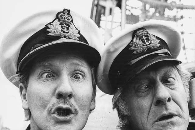 Phillips and co-star Jon Pertwee promote BBC radio show The Navy Lark in 1969 (Picture: Ian Showell/Keystone/Getty Images)