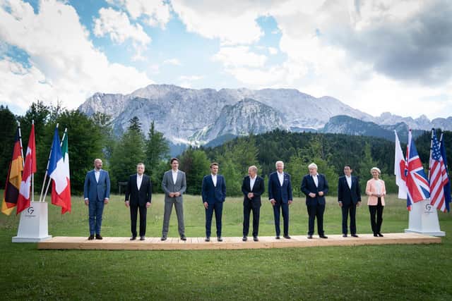 G7 leaders (left to right) European Union Council President Charles Michel, Prime Minister of Italy Mario Draghi, Prime Minister of Canada Justin Trudeau, President of France Emmanuel Macron, German Chancellor Olaf Scholz, US President Joe Biden, Prime Minister Boris Johnson, Prime Minister of Japan Fumio Kishida, and European Union Council Commission President Ursula von der Leyen pose for the family photo during the G7 summit in Schloss Elmau, in the Bavarian Alps, Germany. Picture date: Sunday June 26, 2022.