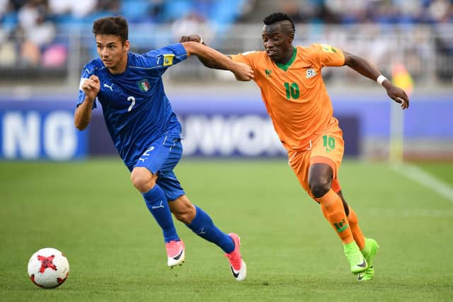 Fashion Sakala (right) in action for Zambia against Italy in the quarter-final of the 2017 FIFA under-20 World Cup in South Korea. (Photo by JUNG YEON-JE/AFP via Getty Images)