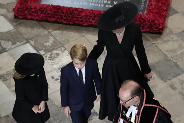 The Princess of Wales, Prince George (centre), and Princess Charlotte (left), arrives for the State Funeral of Queen Elizabeth II, held at Westminster Abbey, London. Picture: Frank Augstein/PA Wire