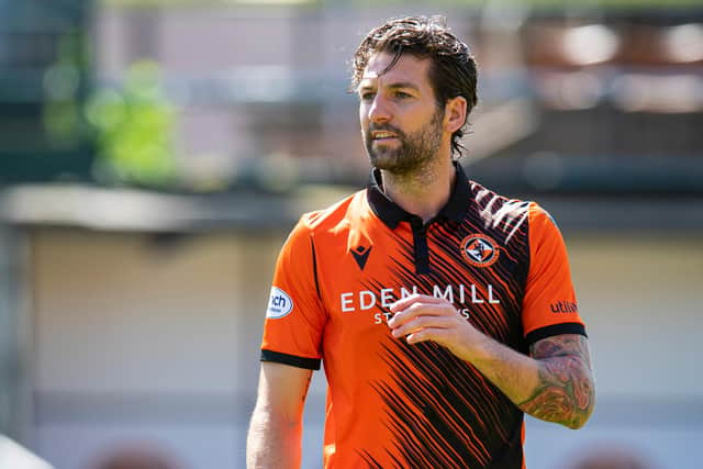 Mulgrew in action for Dundee United against Arbroath when he scored with an audacious free-kick