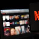 Still the world's premiere streamer, here are the 10 most expensive Netflix series ever, per episode cost. Picture: Olivier DOULIERY/AFP via Getty Images.