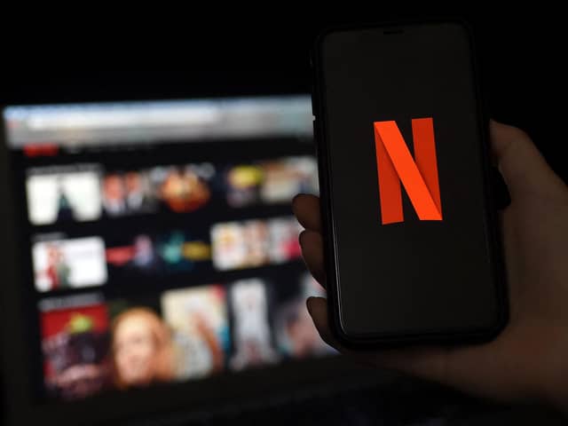 Still the world's premiere streamer, here are the 10 most expensive Netflix series ever, per episode cost. Picture: Olivier DOULIERY/AFP via Getty Images.