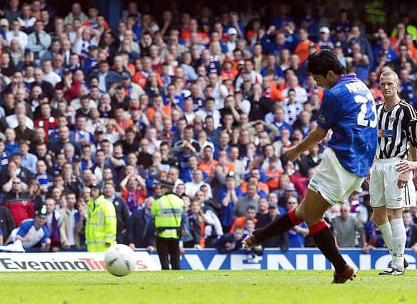 Mikel Arteta, now Arsenal manager, converts an injury-time penalty against Dunfermline to secure the league title for Rangers 20 years ago