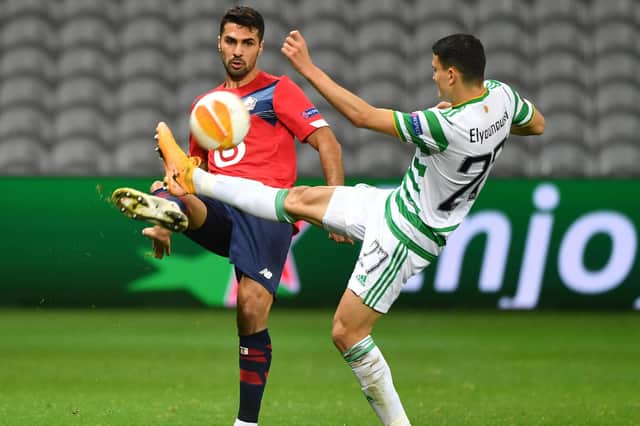Lille's defender Zeki Celik vies for the ball with Celtic's midfielder Mohamed Elyounoussi during the UEFA Europa League Group H football match between Lille and Celtic on October 29, 2020 at the Grand Stade Pierre-Mauroy in Lille. (Photo by DENIS CHARLET / AFP) (Photo by DENIS CHARLET/AFP via Getty Images)