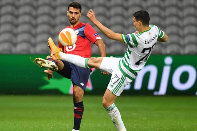 Lille's defender Zeki Celik vies for the ball with Celtic's midfielder Mohamed Elyounoussi during the UEFA Europa League Group H football match between Lille and Celtic on October 29, 2020 at the Grand Stade Pierre-Mauroy in Lille. (Photo by DENIS CHARLET / AFP) (Photo by DENIS CHARLET/AFP via Getty Images)