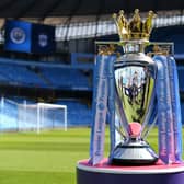 Manchester City can reclaim the Premier League trophy by avoiding defeat at home to Aston Villa on the final day of the season, but any slip-up could allow Liverpool to steal the title if they beat Wolves at Anfield. (Photo by Michael Regan/Getty Images)
