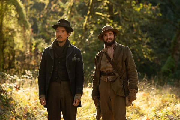 Orion Lee (left) as King-Lu and John Magaro (right) as Cookie in director Kelly Reichardt's First Cow, released by A24 Films. PIC: Allyson Riggs / A24 Films