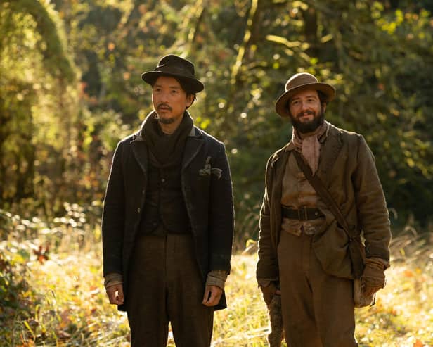 Orion Lee (left) as King-Lu and John Magaro (right) as Cookie in director Kelly Reichardt's First Cow, released by A24 Films. PIC: Allyson Riggs / A24 Films