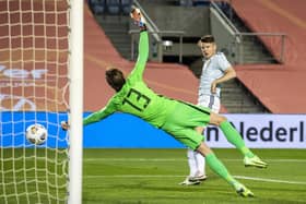 Scotland's Kevin Nisbet scores against Netherlands in a friendly back in 2021.