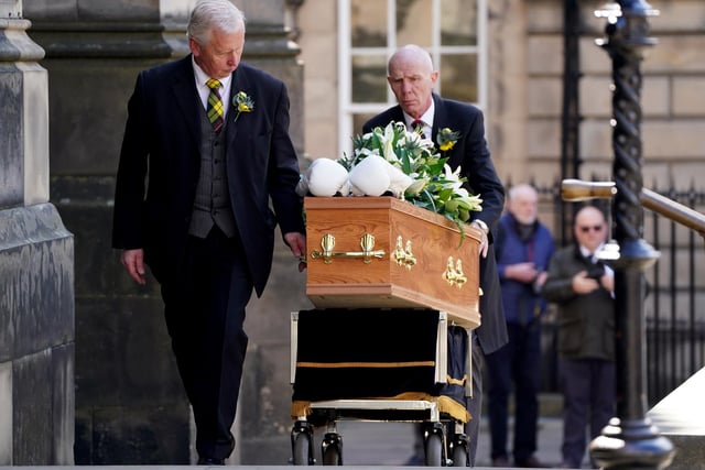 A pair of white boxing gloves rest on the coffin of former boxer Ken Buchanan at St Giles' Cathedral, Edinburgh, ahead of a memorial service. The Scottish boxing great, who became the undisputed world lightweight champion in 1971, died at the beginning of the month, aged 77