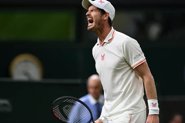 Blast from the past ... Andy Murray roars encouragement to himself on his return to Wimbledon's Centre Court