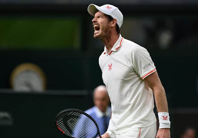 Blast from the past ... Andy Murray roars encouragement to himself on his return to Wimbledon's Centre Court