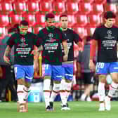 Players from Spanish side Granada protest against the European Super League. (Photo by Fran Santiago/Getty Images)