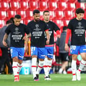 Players from Spanish side Granada protest against the European Super League. (Photo by Fran Santiago/Getty Images)