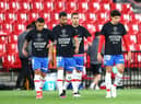 Players from Spanish side Granada protest against the European Super League. (Photo by Fran Santiago/Getty Images)
