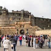 A lot of people in front of Edinburgh Castle Pic Jaroslav Moravcik/Adobe