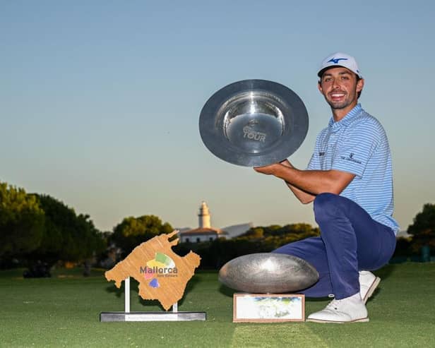 Marco Penge celebrates with his trophies after winning the Rolex Challenge Tour Grand Final supported by The R&A and also the Road to Mallorca Rankings. Picture: Octavio Passos/Getty Images.