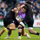 Sione Tuipulotu (centre) impressed against New Zealand. (Photo by Ross Parker / SNS Group)