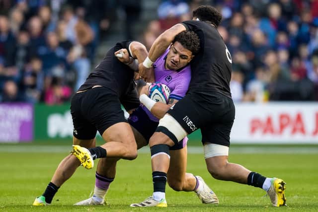 Sione Tuipulotu (centre) impressed against New Zealand. (Photo by Ross Parker / SNS Group)