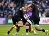 Sione Tuipulotu (centre) impressed against New Zealand. (Photo by Ross Parker / SNS Group)