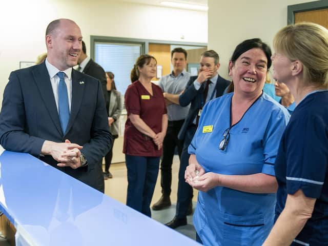 Scottish Health Secretary Neil Gray (left) meets staff working in the Major Trauma Centre, during a visit to Queen Elizabeth University Hospital in Glasgow. Jane Barlow/PA Wire