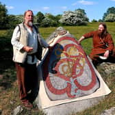 Explaining runestones at Hovgården archaeological site
