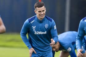 Rangers midfielder Tom Lawrence is enjoying being back on a football pitch again.