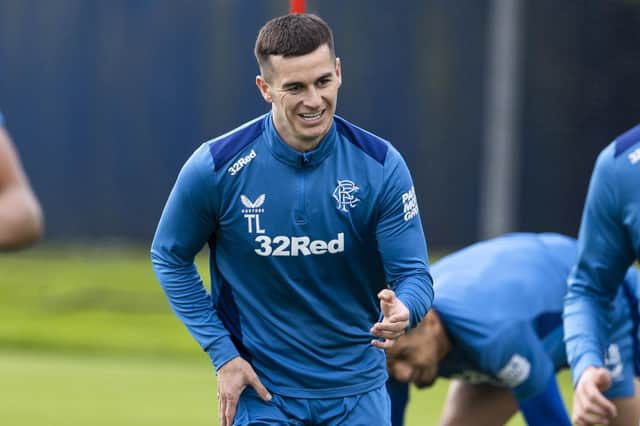 Rangers midfielder Tom Lawrence is enjoying being back on a football pitch again.