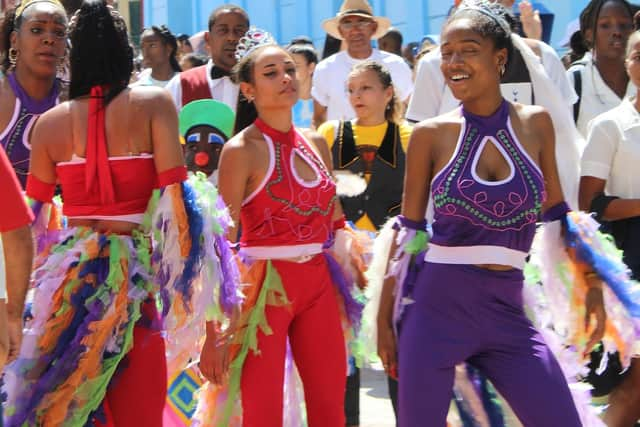 Opening procession for FIDANZ (International Dance Festival) on Calle Enramadas, Santiago de Cuba,  with dancers from Ballet Folklorico Cutumba in traditional conga costumes. Pic: Caledonia Worldwide