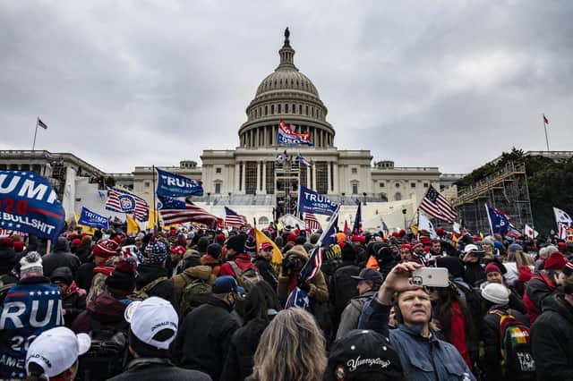Pro-Trump supporters storm the US Capitol after the then outgoing US President falsely told them at a rally that he won the election (Picture: Samuel Corum/Getty Images)