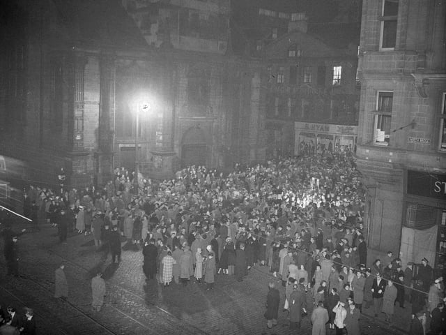 Crowds await the bells at the Tron in 1955.