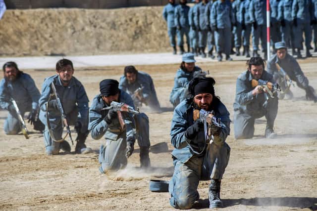 Newly recruited Taliban fighters display their skills during a graduation ceremony at the Abu Dujana National Police Training centre in Kandahar on February 9, 2022. (Photo by Javed TANVEER / AFP) (Photo by JAVED TANVEER/AFP via Getty Images)