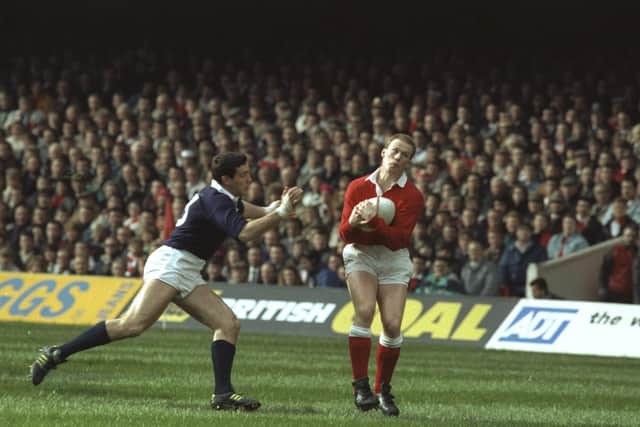 Paul Thorburn (right) of Wales catches the ball as Scott Hastings (left) of Scotland closes in during the 1990 Five Nations Championship match in Cardiff, which Scotland won 13-9. Picture: Russell Cheyne/Allsport