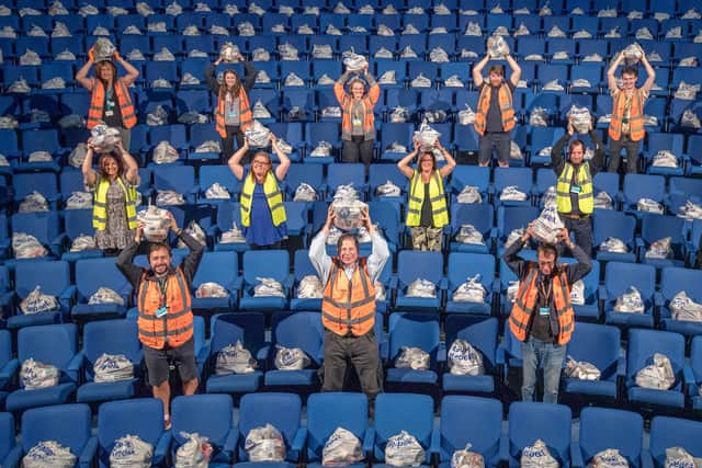 Members of The Highland Council with some of the thousands of food packages filled with supplies for Highlanders still shielding from the coronavirus pandemic in the auditorium of the Empire Theatre at Eden Court in Inverness.