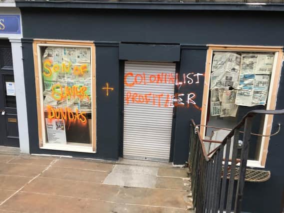 The graffiti appeared under the Dundas Street sign