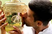 Novak Djokovic of Serbia kisses the trophy after defeating Matteo Berrettini to win Wimbledon last year.
