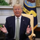 Donald Trump is expected to sign off on scores of executive orders after entering the Oval Office. Picture: Niall Carson/PA Wire