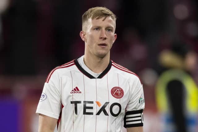 Aberdeen's Ross McCrorie cuts a dejected figure during the 5-0 defeat to Hearts at Tynecastle. (Photo by Mark Scates / SNS Group)