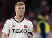 Aberdeen's Ross McCrorie cuts a dejected figure during the 5-0 defeat to Hearts at Tynecastle. (Photo by Mark Scates / SNS Group)