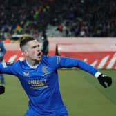 BELGRADE, SERBIA - MARCH 17: Ryan Kent of Rangers celebrates with team mate James Tavernier after scoring their sides first goal during the UEFA Europa League Round of 16 Leg Two match between Crvena Zvezda and Rangers FC at Rajko Mitic Stadium on March 17, 2022 in Belgrade, Serbia. (Photo by Srdjan Stevanovic/Getty Images)
