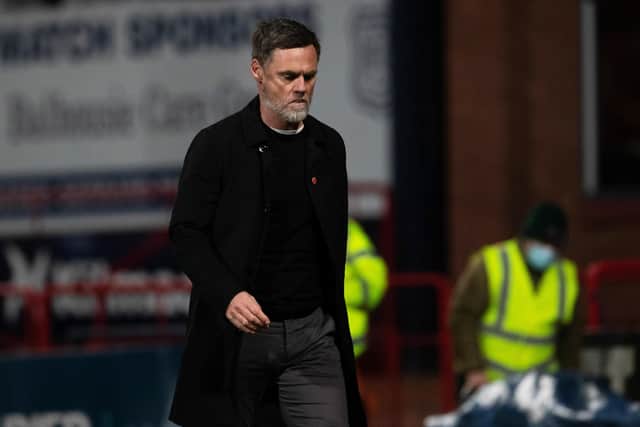 A dejected Motherwell manager Graham Alexander after the 3-0 defeat to Dundee (Photo by Craig Foy / SNS Group)