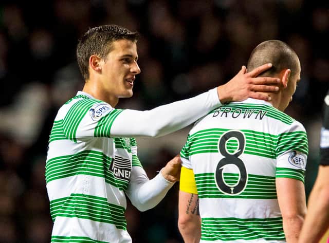 Aleksandar Tonev claps Celtic captain Scott Brown, who says he "stuck up" for the Bulgarian over his 2014 racial abuse of soon-to-be Aberdeen team-mate Shay Logan because Tonev "swore he didn't do it". [Photo by Sammy Turner/SNS Group).