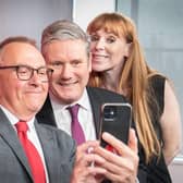 The newly elected leader of Plymouth council, Tudor Evans takes a selfie photograph with Labour leader Sir Keir Starmer and deputy Labour Party leader Angela Rayner