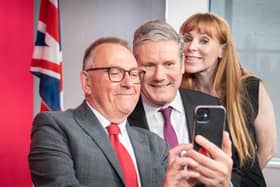 The newly elected leader of Plymouth council, Tudor Evans takes a selfie photograph with Labour leader Sir Keir Starmer and deputy Labour Party leader Angela Rayner