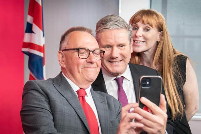 The newly elected leader of Plymouth council, Tudor Evans takes a selfie photograph with Labour leader Sir Keir Starmer and deputy Labour Party leader Angela Rayner