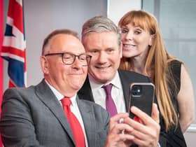 The newly elected leader of Plymouth council, Tudor Evans takes a selfie photograph with Labour leader Sir Keir Starmer and deputy Labour Party leader Angela Rayner