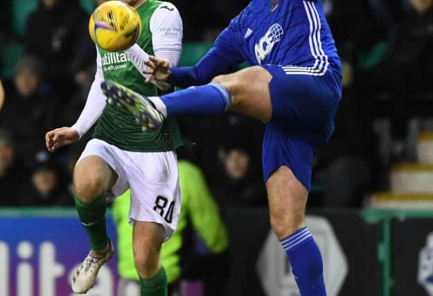 Hibs' Ewan Henderson and Cove Rangers' Morgyn Neill during the Scottish Cup Fourth Round tie that went through extra time. (Photo by Craig Foy / SNS Group)
