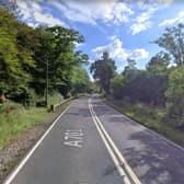 Police believe a 48-year-old woman may have fallen from a moving vehicle onto the A701.